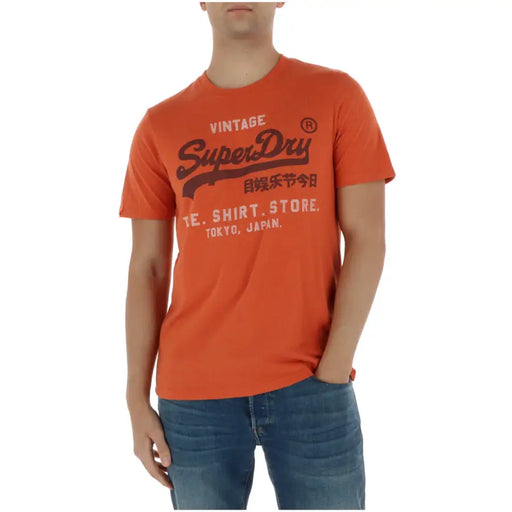 Superdry Herren-T-Shirt, orange, Kurzarm, Baumwollmischung, mit schwarzem Vintage-Grafikdruck und Details, Modell M1012216A
