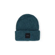 Teal knit beanie showcasing warmth and style for cozy winter attire