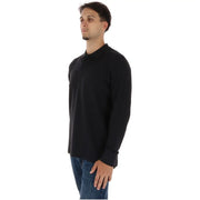 Timberland Schwarzes Baumwoll-Poloshirt für Herren mit klassischem Kragen und gerippten Bündchen, Vorderansicht