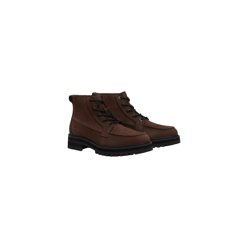 Timberland Braune Herren-Lederstiefel mit mittelhoher Schnürung, schwarzen Schnürsenkeln und robuster Gummisohle für den dauerhaften Einsatz im Arbeitsalltag.