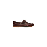 Timberland Braune Herren-Mokassins aus Leder mit hellbraunen Ziernähten und Gummisohle im Stil brauner Bootsschuhe.
