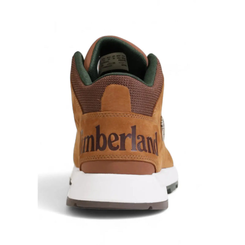 Timberland men’s brown leather sneakers in tan suede with brown mesh and green accents for fall winter use