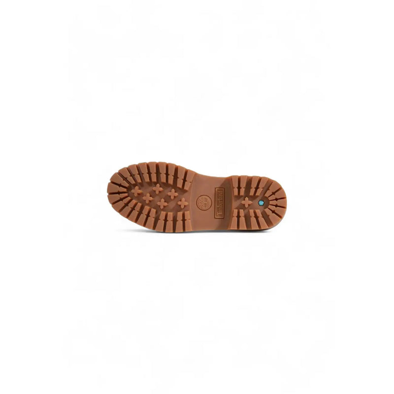 Brown rubber sole with rugged textured tread and timberland logo on heel of timberland women brown polyurethane mid lace boot