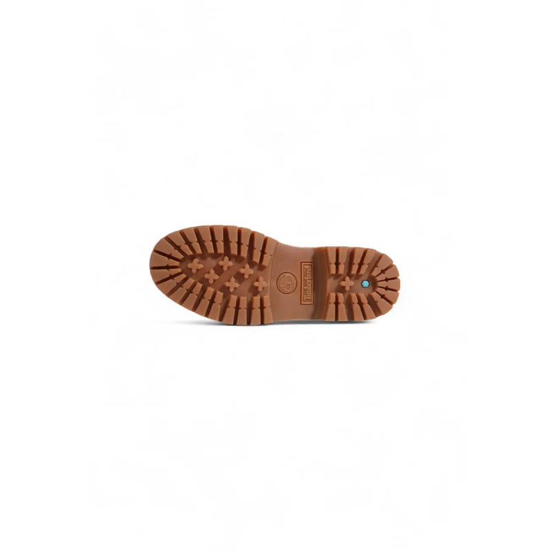 Brown rubber sole with textured tread and embossed Timberland logo on beige leather women ankle boot