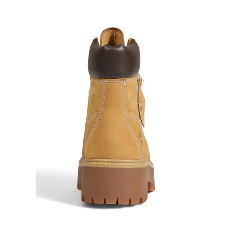 Timberland women leather ankle boots beige lace up with tan suede upper, dark brown leather collar, and chunky rubber sole