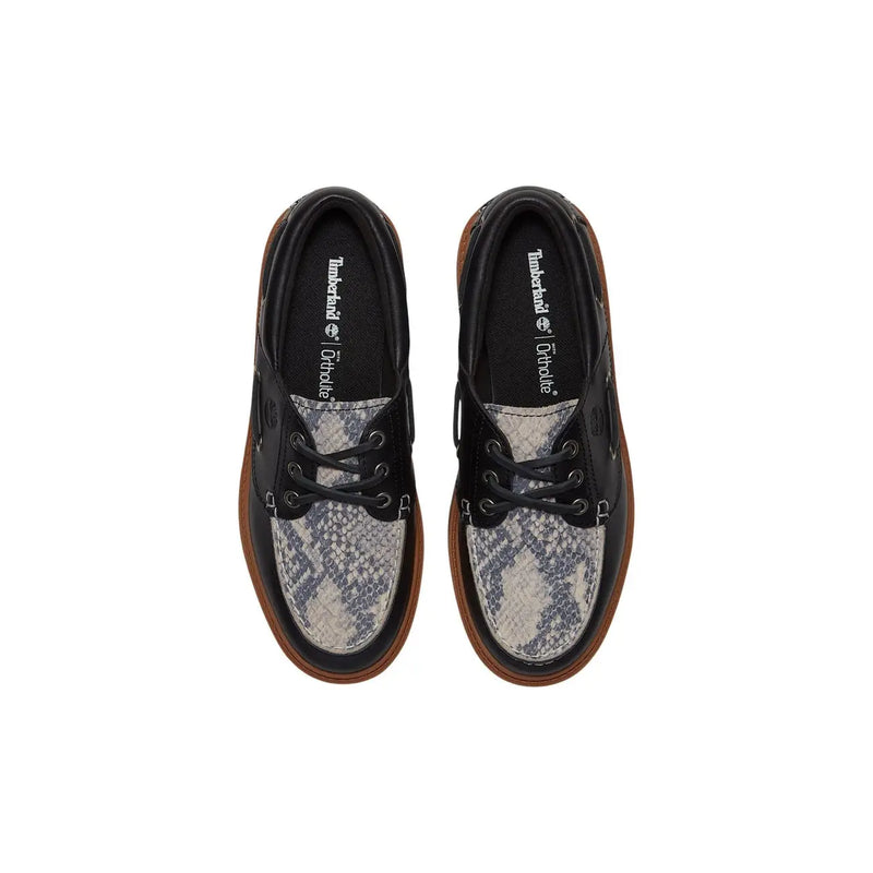 Timberland women leather platform shoes in black with black and gray snake-print and brown rubber soles low-top sneakers