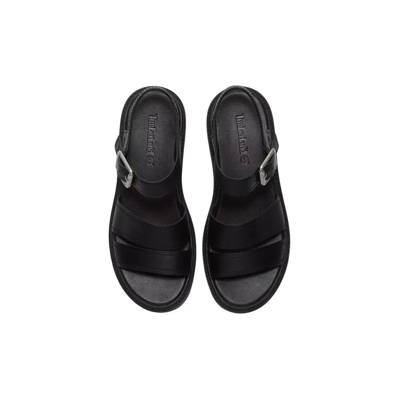Timberland women leather sandals in black featuring silver buckle straps and a cushioned sole for comfort