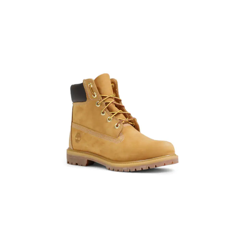 Timberland women’s beige leather ankle boots with tan 6-inch boot design black collar and gold-tone eyelets