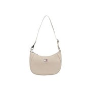 Beige tommy hilfiger women’s shoulder bag with zip pocket and minimalist design featuring a signature flag patch