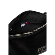 Tommy Hilfiger black faux leather handbag with silver zippers and branded patch and a zip pocket