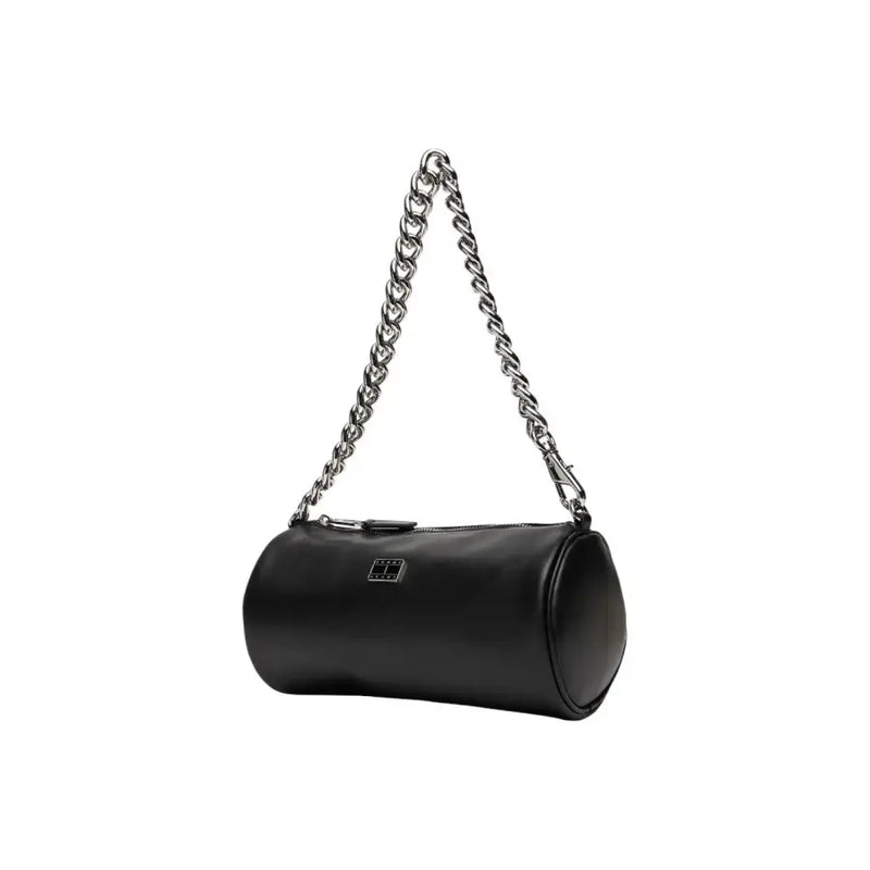 Tommy Hilfiger black faux leather cylindrical handbag with silver chain strap and small rectangular logo plaque