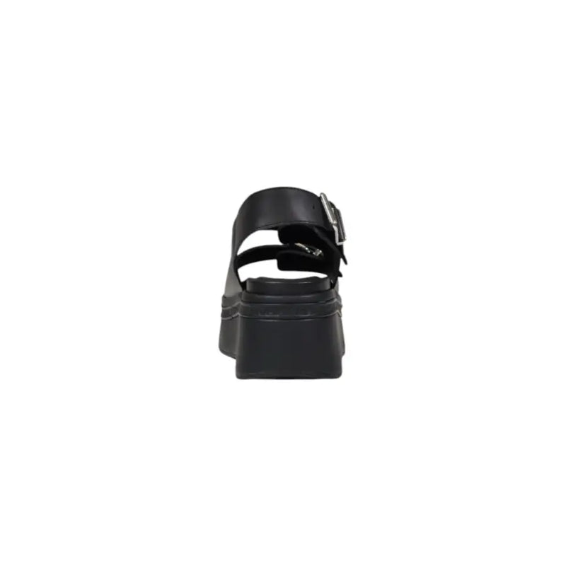 Tommy Hilfiger black leather wedge shoes for women featuring a single strap and silver buckle platform sandal
