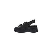Tommy Hilfiger black leather wedge shoes for women with two adjustable straps and a thick chunky platform sole