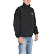 Tommy Hilfiger black long zip blazer for men with small embroidered crest on left chest suitable for fall winter