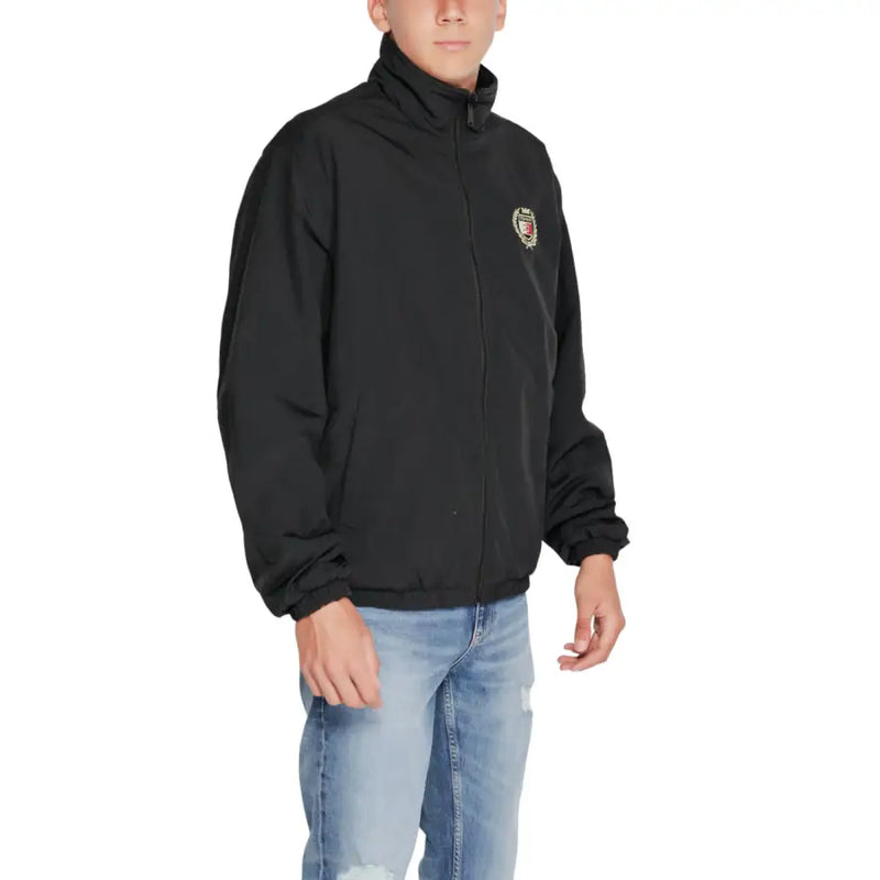 Tommy Hilfiger black long zip blazer for men with small embroidered crest on left chest suitable for fall winter