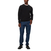 Tommy hilfiger black crewneck sweater with white trim.