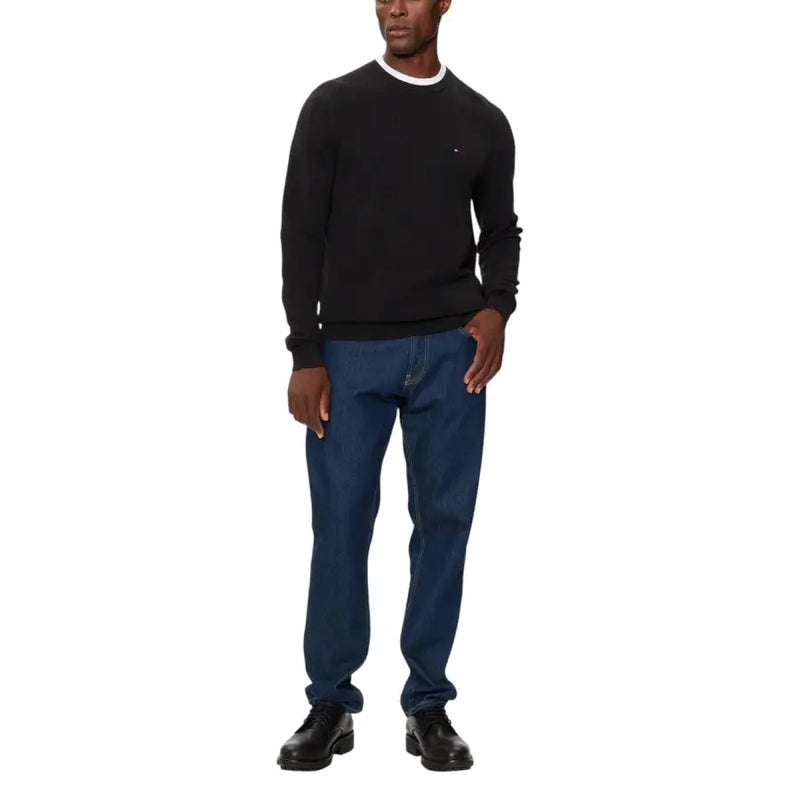 Tommy hilfiger black crewneck sweater with white trim.