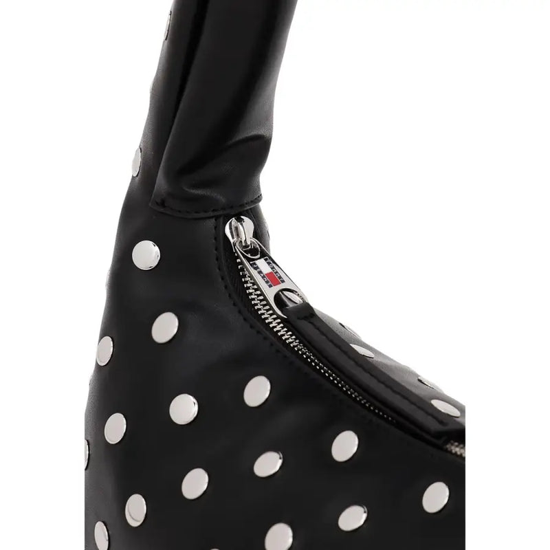 Tommy Hilfiger black polyurethane handbag with silver polka dots and zipper closure shoulder bag design