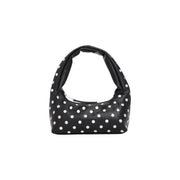Tommy Hilfiger black polyurethane hobo bag with white polka dots and zip pocket in a soft structured silhouette