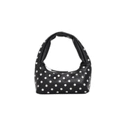 Tommy Hilfiger black polyurethane hobo bag with white polka dots and zip pocket in a soft structured silhouette
