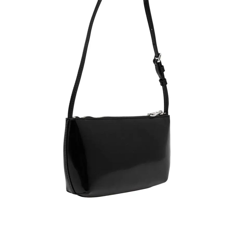 Tommy Hilfiger black glossy patent leather crossbody bag with silver zipper and adjustable strap for women