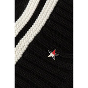 Tommy hilfiger black wool blend womens cap featuring a small three-colored red white and black enamel star pin on knit fabric