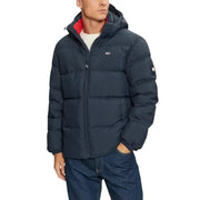 Tommy hilfiger navy blue puffer jacket with red lining and hood.