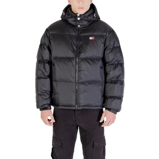 Black puffer jacket with hood and logo patch, tommy hilfiger brand.