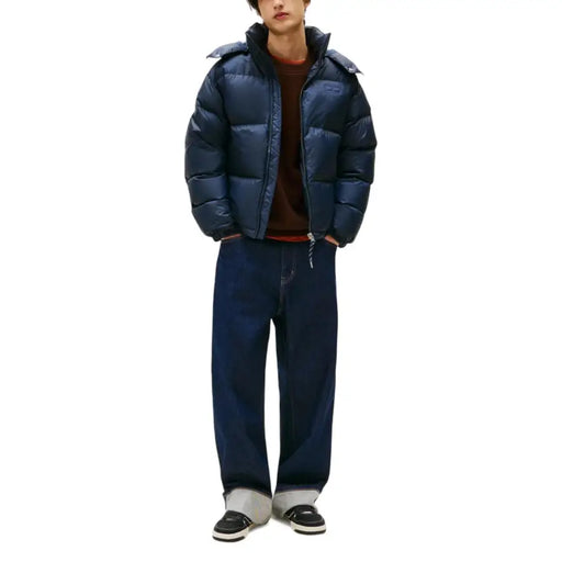 Navy blue puffer jacket with hood and quilted design, popular brand lacoste.