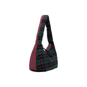 Tommy Hilfiger quilted shoulder bag with bold red and dark green plaid and contrasting fabric strap panels
