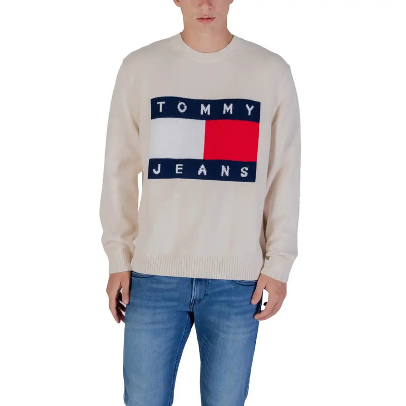 Tommy jeans cream sweater with red and blue flag design.