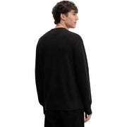 Schwarzer, gerippter Strickpullover mit Rundhalsausschnitt und langen Ärmeln aus Bio-Baumwolle von Tommy Hilfiger Jeans Männer