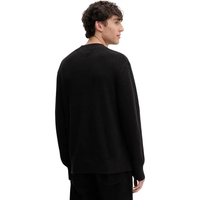 Schwarzer, gerippter Strickpullover mit Rundhalsausschnitt und langen Ärmeln aus Bio-Baumwolle von Tommy Hilfiger Jeans Männer