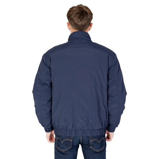Marineblaue, wattierte Nylon-Bomberjacke mit elastischem Bund und gerippten Bündchen von Tommy Hilfiger Jeans Herrenmodell dm0dm17238