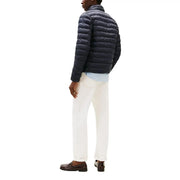 Marineblaue gesteppte Nylon-Reißverschlussjacke für Herren von Tommy Hilfiger Jeans Modell DM0DM20658, von vorn gesehen