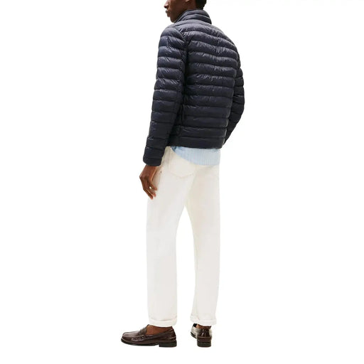 Marineblaue gesteppte Nylon-Reißverschlussjacke für Herren von Tommy Hilfiger Jeans Modell DM0DM20658, von vorn gesehen