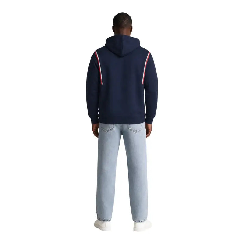 Tommy Hilfiger Jeans Herren-Hoodie aus blauer Bio-Baumwolle mit marineblauen Seitenteilen und rot-weiß gestreiften Einsätzen