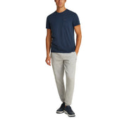 Navy blue tommy hilfiger jeans men round neck cotton t shirt with short sleeves chest pocket and subtle logo detail