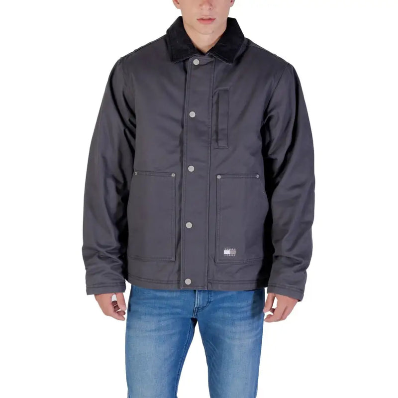 Charcoal gray men’s casual jacket with black collar and button closure, featuring two patch pockets.