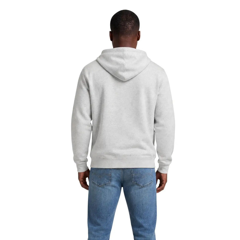 Tommy Hilfiger Jeans men grey organic cotton hoodie with a classic fit and ribbed cuffs in soft light gray
