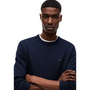 Navy blue ribbed knit crewneck sweater with white trim and tommy hilfiger logo in organic cotton knitwear