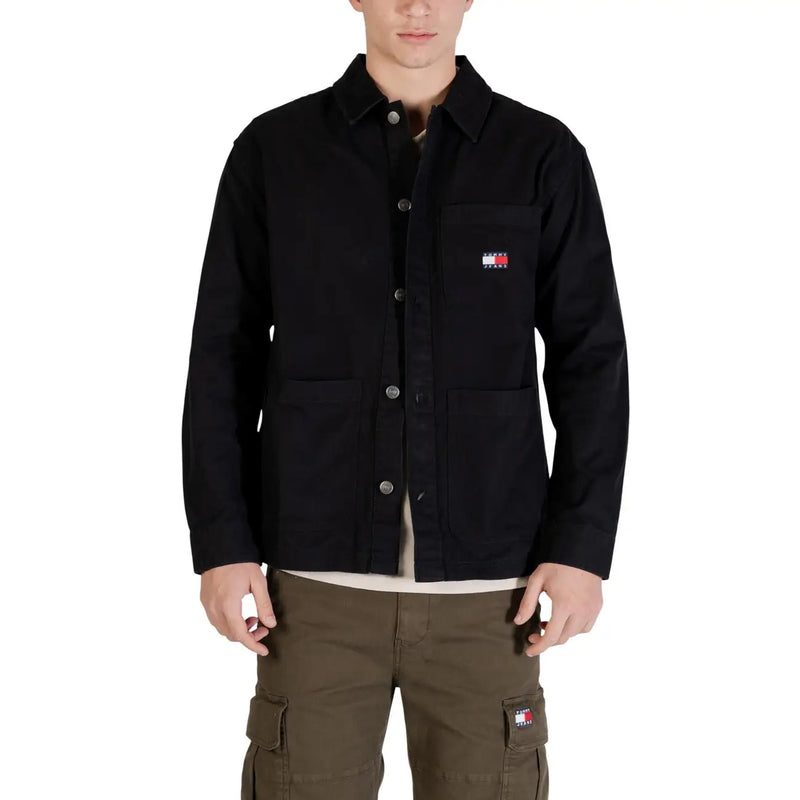 Black tommy hilfiger work jacket with button closures and small logo patch on chest for men