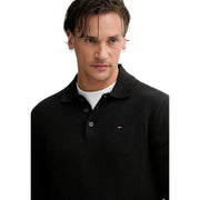 Black textured knit slim polo shirt with small Tommy Hilfiger logo made of organic cotton for men
