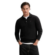 Schwarzer, schmal geschnittener Tommy Hilfiger Polo-Pullover mit gerippten Bündchen und Saum aus Bio-Baumwolle für Herren