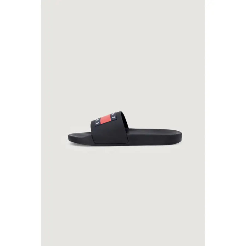 Schwarze Gummisandalen mit kräftigen roten und marineblauen Akzenten Tommy Hilfiger Jeans Logostreifen am Fußriemen, Größe 2
