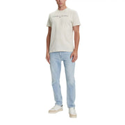 Beige tommy hilfiger jeans men t-shirt with black logo print across the chest made from comfortable fabric
