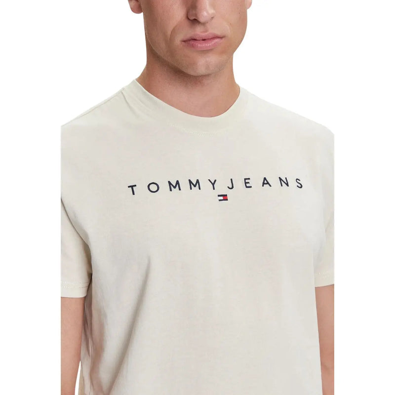 Cream-colored Tommy Hilfiger Jeans men t-shirt with black Tommy Jeans lettering and a small flag logo beneath it