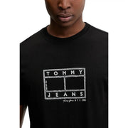 Black Tommy Hilfiger jeans men t-shirt with white chalk-style Tommy Jeans NYC 1985 logo on front