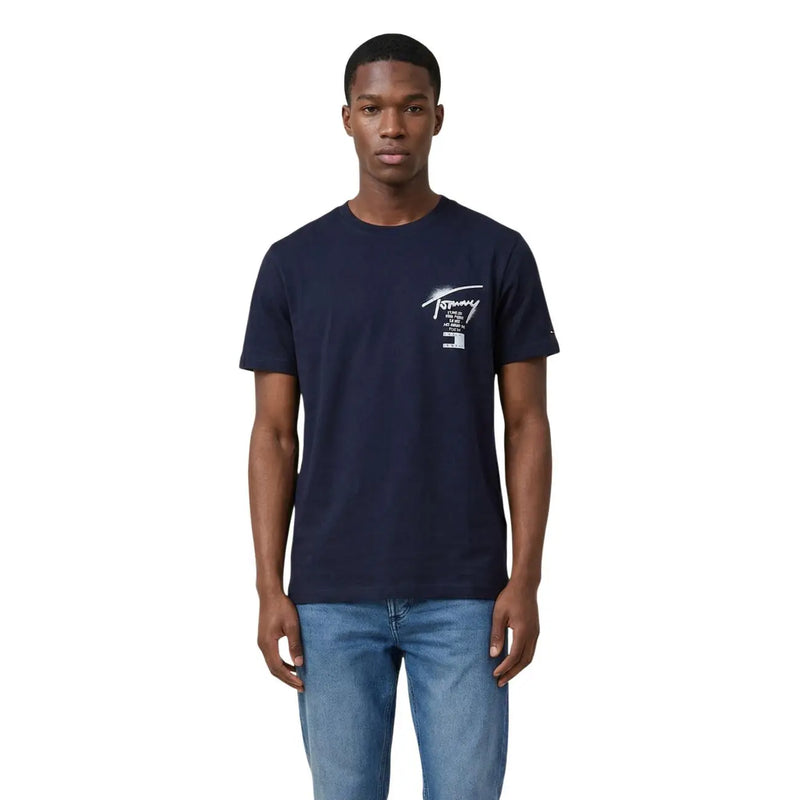 Navy blue Tommy Hilfiger Jeans men t-shirt featuring short sleeves and a white logo print on the chest