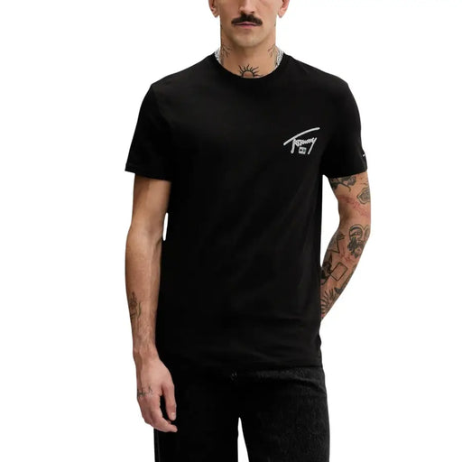 Black tommy hilfiger jeans men t-shirt with white logo on the left chest made from comfortable cotton material